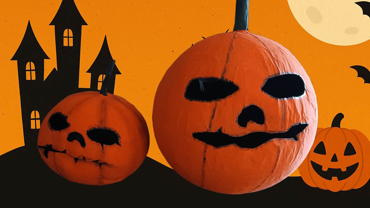 Niños hacen una calabaza de papel para Halloween con globos, papel y pintura